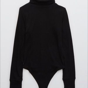 Black turtleneck body suit